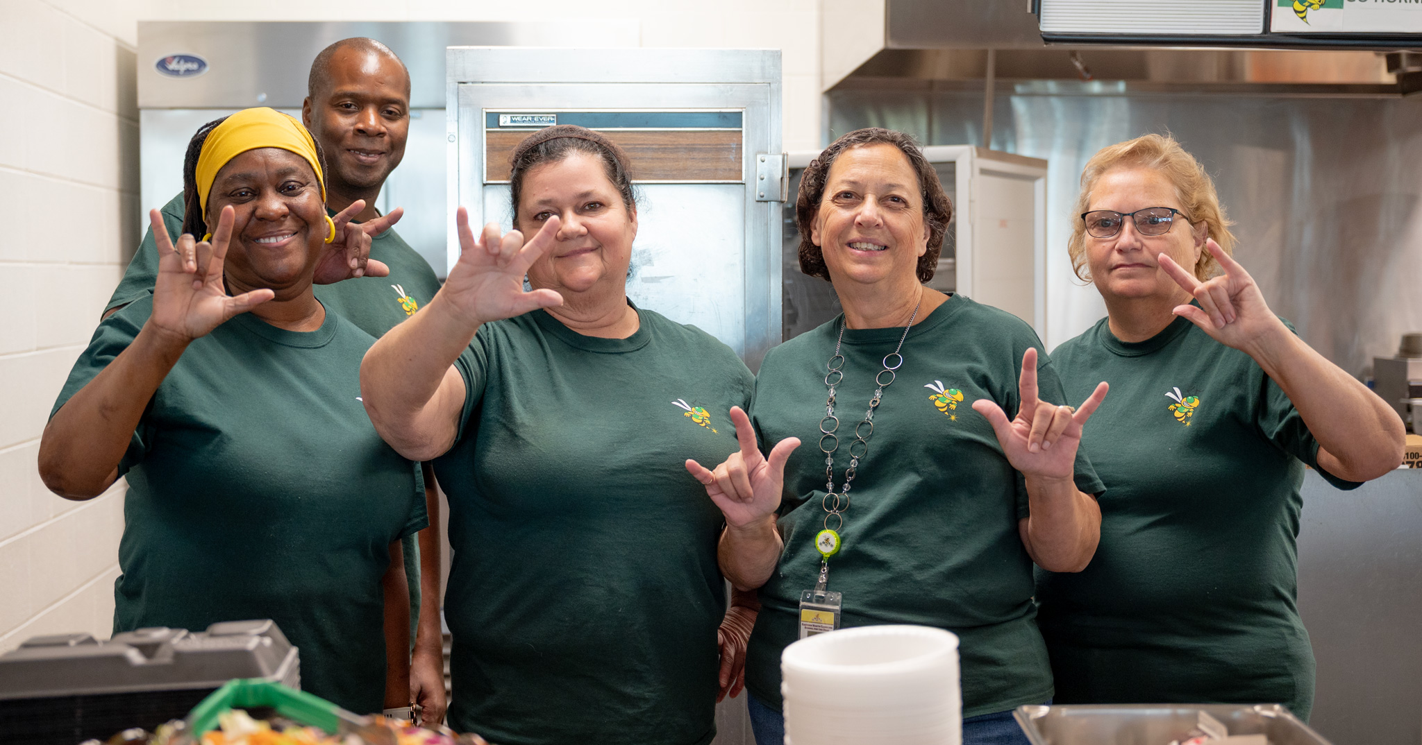 Fall Fest: The dietary staff smiling after a diligent day preparing lunch