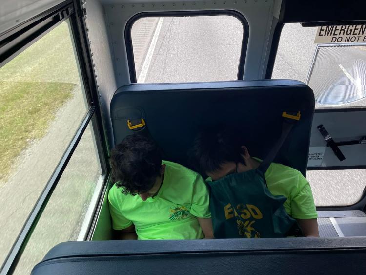 Sleepy students in school bus