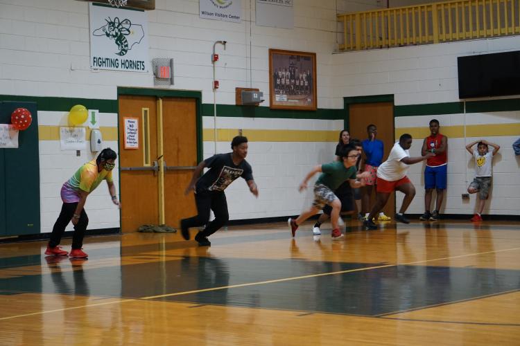 High school students running a race.