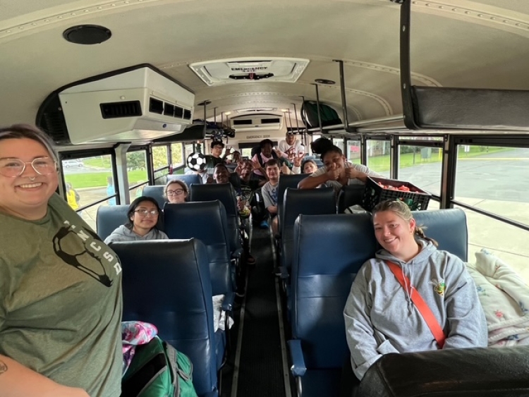 coed soccer team on bus 