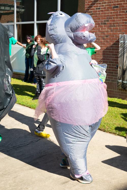 Christine Cantin in a hippo mascot suit