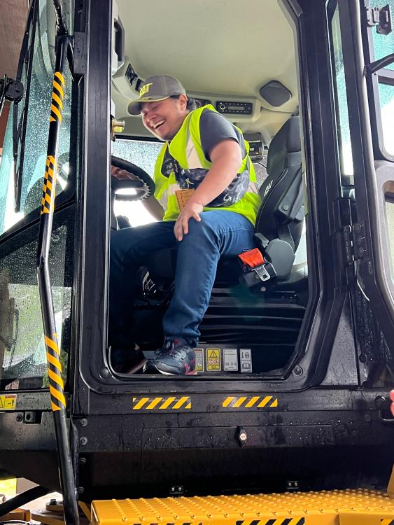 Student in a Caterpillar wheel dozer