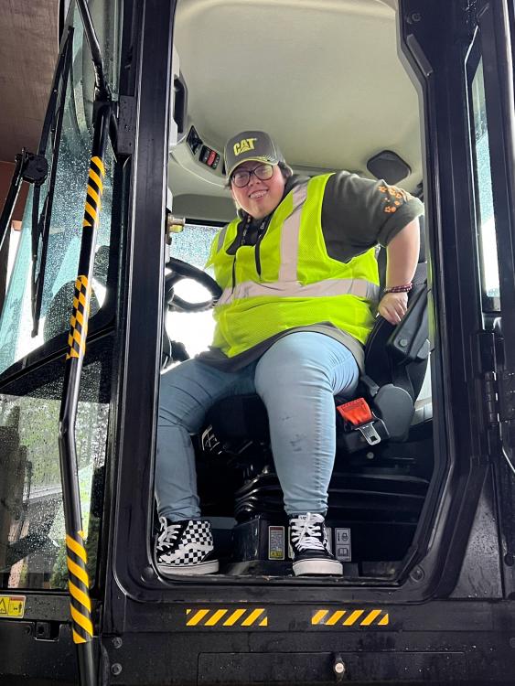 Student in a Caterpillar wheel dozer