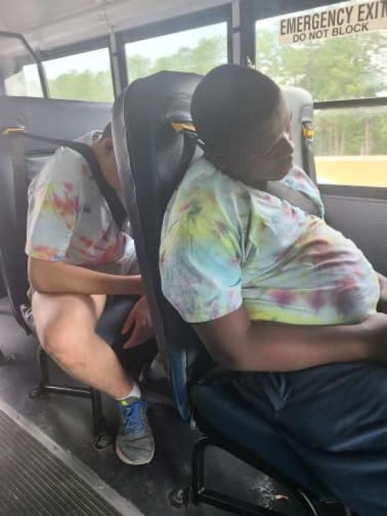 Student asleep on bus