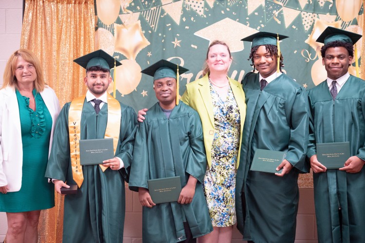 Graduates with Principal and Director