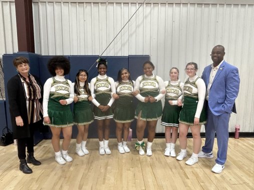 ENCSD superintendent Cheryl Iannucci, the cheerleading squad, and Principal Kent